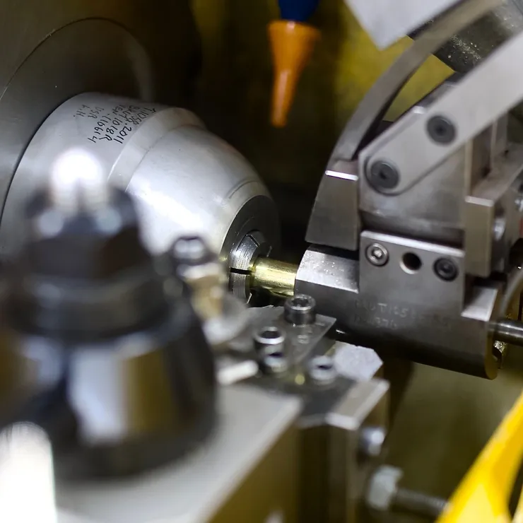 CNC precision machining a brass cartridge